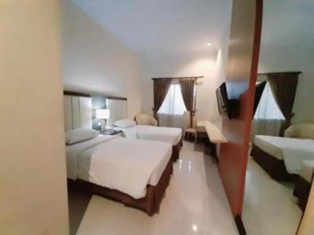 Bella Hotel Surabaia Exterior foto